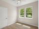 Bright room features large windows offering natural light and views of outside at 202 Resinwood Rd, Moncks Corner, SC 29461