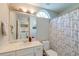 Bathroom with white vanity, decorative shower curtain, and an arched window at 208 Evesham Dr, Summerville, SC 29485