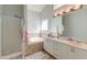 Bright bathroom featuring a double vanity, tiled shower, and separate tub at 208 Evesham Dr, Summerville, SC 29485