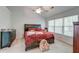 Comfortable bedroom with a ceiling fan, soft carpet, and a window at 208 Evesham Dr, Summerville, SC 29485