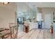 Open-concept kitchen featuring bar, and stainless steel appliances at 208 Evesham Dr, Summerville, SC 29485