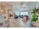 Bright living room with an open floor plan, vaulted ceilings, and modern decor with views into the bedroom at 208 Evesham Dr, Summerville, SC 29485