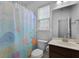 A kid-friendly bathroom includes a colorful shower curtain and vanity at 218 Wexford Ct, Summerville, SC 29483
