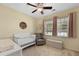 Charming Bedroom with a crib, glider, and changing table, bathed in natural light and soft colors at 218 Wexford Ct, Summerville, SC 29483