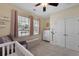 Bright Bedroom with a crib, dresser, rocking chair, and ample storage space at 218 Wexford Ct, Summerville, SC 29483