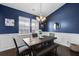 Charming dining room with modern chandelier and hardwood flooring, perfect for Gathering gatherings at 218 Wexford Ct, Summerville, SC 29483