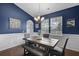 Charming dining room with modern chandelier and hardwood flooring, perfect for Gathering gatherings at 218 Wexford Ct, Summerville, SC 29483