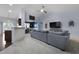 Open-concept living room with ample natural light and a view into the dining area at 218 Wexford Ct, Summerville, SC 29483