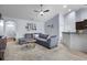 Cozy living room with plush sectional, adjacent to kitchen, ideal for entertaining at 218 Wexford Ct, Summerville, SC 29483