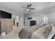Comfortable bedroom with a ceiling fan, neutral colors, and easy access to ensuite at 218 Wexford Ct, Summerville, SC 29483