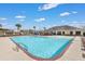 Community pool with a splash pad, playground, and nearby clubhouse at 218 Wexford Ct, Summerville, SC 29483
