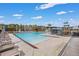 Community pool with ample lounge chairs and cabanas at 218 Wexford Ct, Summerville, SC 29483