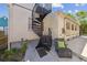 Backyard view with a spiral staircase at 22 Sheppard St, Charleston, SC 29403