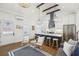 Bright, open-concept kitchen with stainless steel appliances, island seating, and shiplap walls at 22 Sheppard St, Charleston, SC 29403