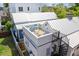 This home boasts a rooftop deck with a spiral staircase and stylish outdoor seating at 22 Sheppard St, Charleston, SC 29403