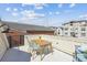 Charming rooftop deck featuring a table with seating for four, perfect for enjoying city views at 22 Sheppard St, Charleston, SC 29403