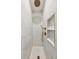 Beautiful shower featuring marble tile, rain head and gold fixtures at 22 Sheppard St, Charleston, SC 29403