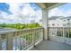 Relaxing balcony offering views of trees and the adjacent building, providing a serene outdoor space at 2244 Ashley Crossing Drive Dr # 621, Charleston, SC 29414