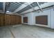 Spacious parking garage with individual wooden storage units, providing ample space at 2244 Ashley Crossing Drive Dr # 621, Charleston, SC 29414