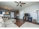 Spacious living room with fan, couch, and adjacent dining area, perfect for gatherings at 2244 Ashley Crossing Drive Dr # 621, Charleston, SC 29414