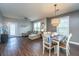 Spacious living room featuring a cozy sectional sofa, ample natural light, and an adjacent dining area at 2244 Ashley Crossing Drive Dr # 621, Charleston, SC 29414