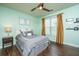 Comfortable bedroom featuring a ceiling fan, neutral walls, hardwood floors, and ample natural light at 2244 Ashley Crossing Drive Dr # 621, Charleston, SC 29414