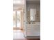 Elegant bathroom with pool views, featuring custom vanity and modern fixtures at 2407 Atlantic Ave, Sullivans Island, SC 29482