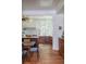 Open kitchen design with hardwood floors, dark wood cabinets and dining area visible at 2407 Atlantic Ave, Sullivans Island, SC 29482