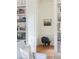 Cozy living room view with bookshelf and a sheep statue, blending design with character at 2407 Atlantic Ave, Sullivans Island, SC 29482