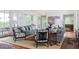 Spacious living room with comfortable seating, large windows, and stylish furnishings at 2407 Atlantic Ave, Sullivans Island, SC 29482