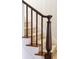 Close up of a staircase with wood banister and carpet runner at 2407 Atlantic Ave, Sullivans Island, SC 29482