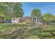 Large backyard with a deck, perfect for outdoor entertaining and relaxation at 2645 Mona Ave, Charleston, SC 29414