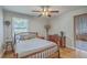 Bright bedroom with hardwood floors, ample natural light, and classic furnishings at 2645 Mona Ave, Charleston, SC 29414