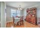 Charming dining room featuring hardwood floors and a traditional hutch at 2645 Mona Ave, Charleston, SC 29414