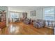 Spacious living room boasting hardwood floors, charming decor and plenty of natural light at 2645 Mona Ave, Charleston, SC 29414