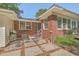 Back patio area with a brick floor and space for entertaining at 2645 Mona Ave, Charleston, SC 29414
