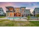 Beautiful backyard featuring a pool, covered patio, and a modern two-story home at dusk at 2732 Canebreak Ln, Mount Pleasant, SC 29466