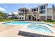 Charming backyard with sparkling pool and spa, and the house with a lovely screened in porch at 2732 Canebreak Ln, Mount Pleasant, SC 29466