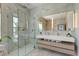 Bathroom featuring a glass enclosed shower, double sink vanity and stone tiling at 2732 Canebreak Ln, Mount Pleasant, SC 29466