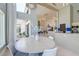 Open-concept dining area featuring contemporary décor and natural light with modern table and chairs at 2732 Canebreak Ln, Mount Pleasant, SC 29466