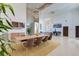 Elegant dining room with modern lighting, ample seating, and stylish decor, perfect for entertaining guests at 2732 Canebreak Ln, Mount Pleasant, SC 29466
