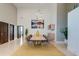 Bright dining room with a large table, seating for eight, and modern lighting fixture at 2732 Canebreak Ln, Mount Pleasant, SC 29466