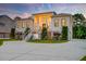 Stunning waterfront home with elegant pillars and beautifully landscaped front yard at 2732 Canebreak Ln, Mount Pleasant, SC 29466