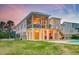 Charming elevated home showcasing a spacious backyard and stylish outdoor living areas at 2732 Canebreak Ln, Mount Pleasant, SC 29466