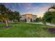 Beautiful home at sunset with a well-manicured lawn, tasteful landscaping and an inviting front entrance at 2732 Canebreak Ln, Mount Pleasant, SC 29466