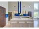 Modern kitchen with stainless steel appliances, center island, and stylish blue backsplash at 2732 Canebreak Ln, Mount Pleasant, SC 29466