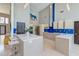 Bright, modern kitchen with an island, stainless appliances, and stylish pendant lighting at 2732 Canebreak Ln, Mount Pleasant, SC 29466