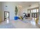 Bright and open living space with a plant feature, seating area, and high ceilings at 2732 Canebreak Ln, Mount Pleasant, SC 29466