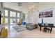 Bright and open living room with floor-to-ceiling windows, modern decor, and a sleek, contemporary design at 2732 Canebreak Ln, Mount Pleasant, SC 29466