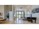 Spacious living room with modern decor, a piano, and tall windows providing natural light at 2732 Canebreak Ln, Mount Pleasant, SC 29466